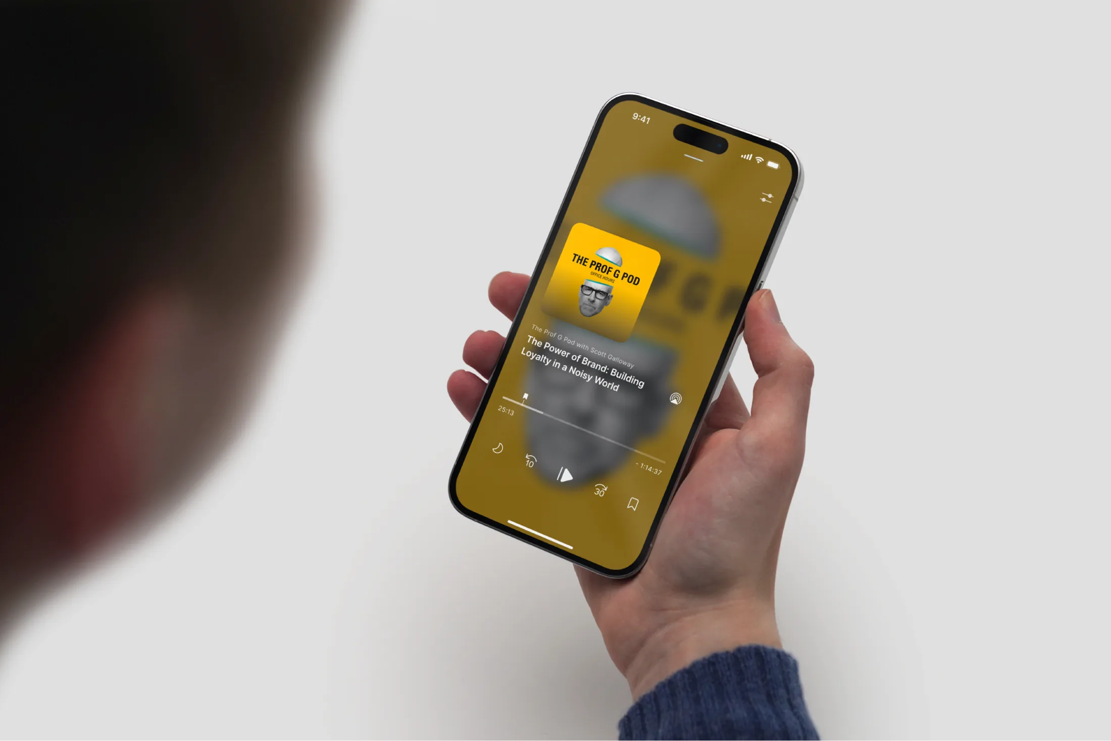 CueUp now playing on an iPhone held in hand